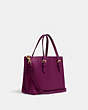 COACH®,MOLLIE TOTE 25 WITH SIGNATURE CANVAS INTERIOR,Signature Coated Canvas,Large,Im/Dark Magenta/Brown,Angle View