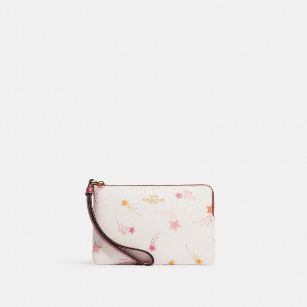 COACH Corner Zip Wristlet In Floral Print Coated Canvas in Blue