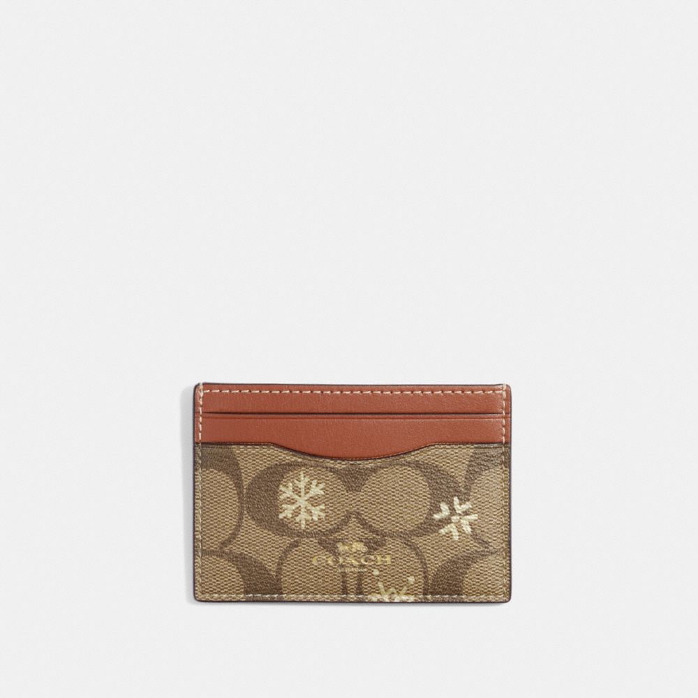 COACH®,CARD CASE IN SIGNATURE CANVAS WITH SNOWFLAKE PRINT,Signature Coated Canvas,Mini,Im/Khaki/Gold Multi,Front View