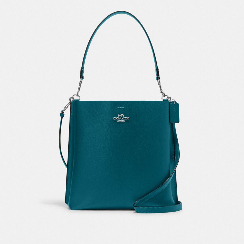 Turquoise 2025 purse coach