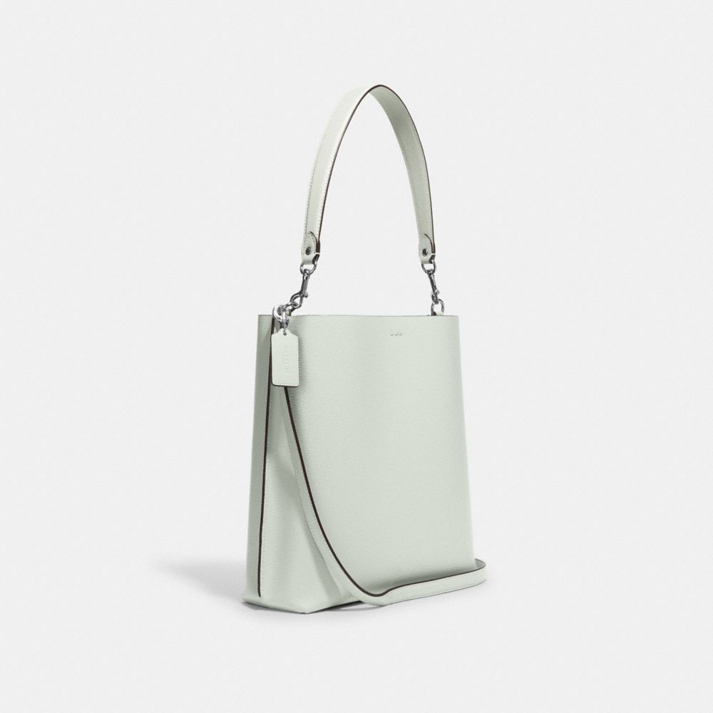 COACH®,Mollie Bucket Bag With Signature Canvas Interior,,Angle View