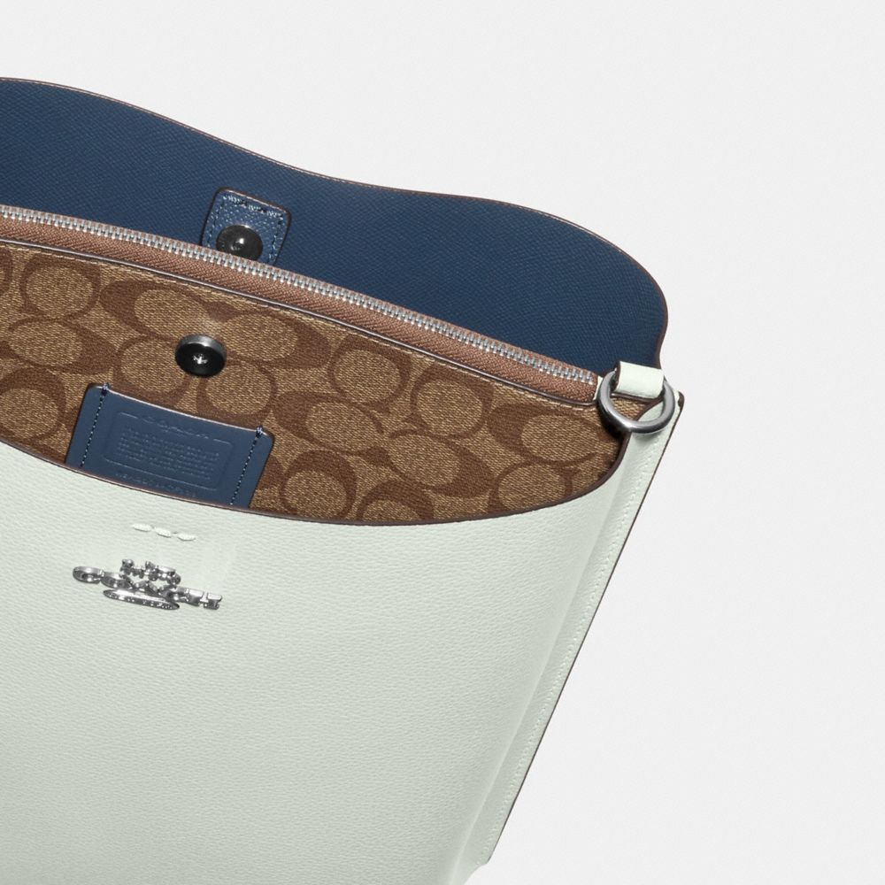 COACH®,Mollie Bucket Bag With Signature Canvas Interior,,Closer View