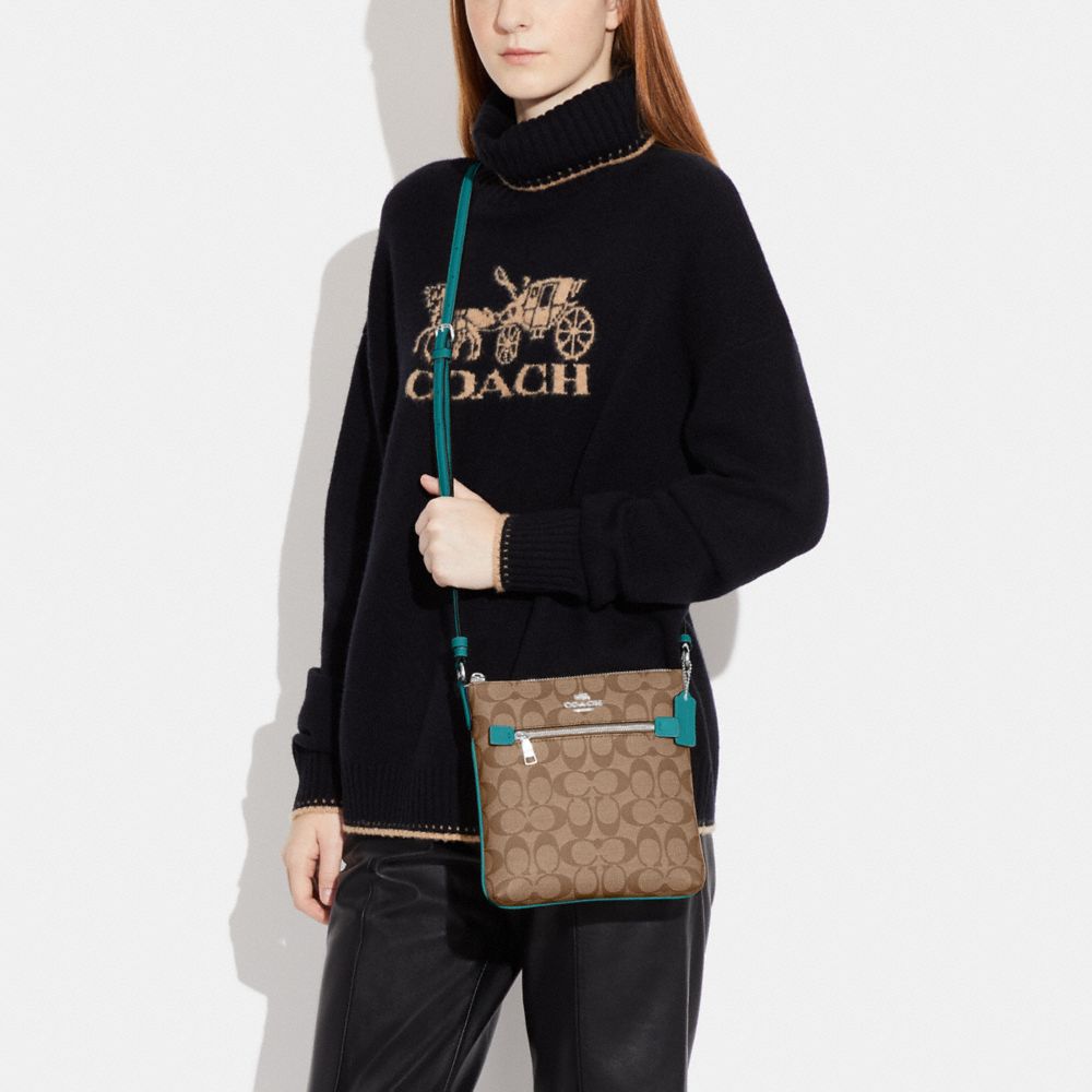 COACH®,Mini Rowan File Bag In Signature Canvas,Canvas,Leather,Crossbody,Logo,Gold Metal,Casual,Multi Color,Detail View