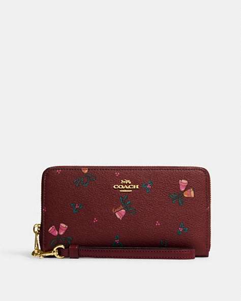 COACH®,LONG ZIP AROUND WALLET WITH HOLIDAY BELLS PRINT,Printed Coated Canvas,Mini,Gold/Black Cherry Multi,Front View