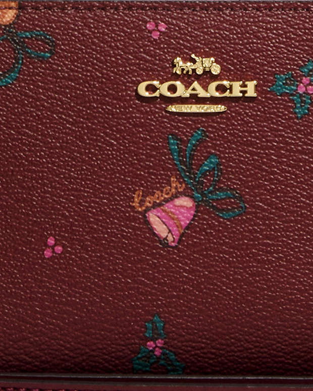COACH® | Long Zip Around Wallet With Holiday Bells Print