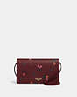 COACH®,ANNA FOLDOVER CLUTCH CROSSBODY WITH HOLIDAY BELLS PRINT,Mini,Gold/Black Cherry Multi,Front View