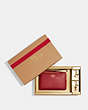 COACH®,BOXED CORNER ZIP WRISTLET,Crossgrain Leather,Mini,Gold/1941 Red,Front View