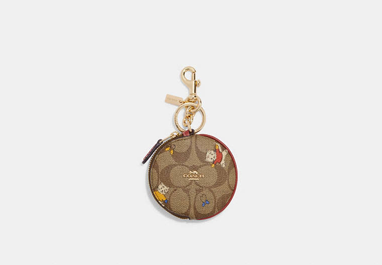 COACH®,CIRCULAR COIN POUCH IN SIGNATURE CANVAS WITH CAT MITTENS PRINT,Signature Coated Canvas,Gold/Khaki Multi,Front View