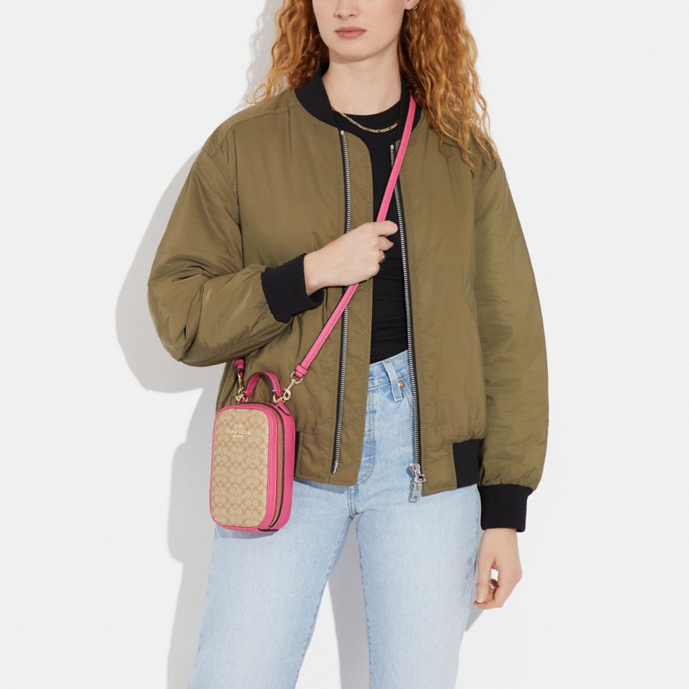 COACH®,Eva Phone Crossbody In Colorblock Micro Signature Canvas,,Detail View
