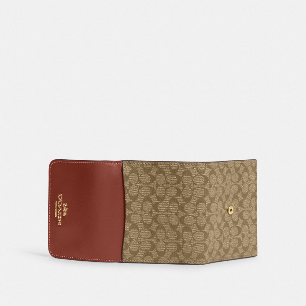 Coach checkbook wallet discount in signature canvas