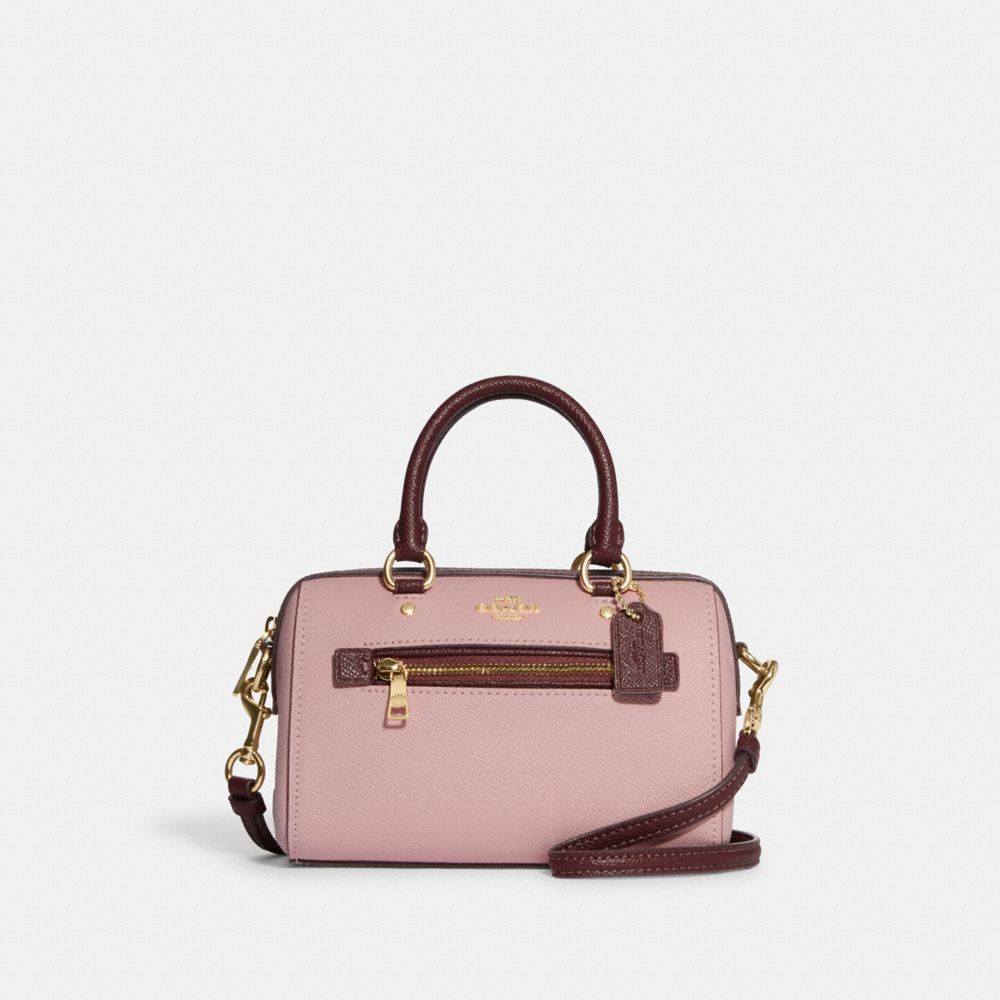 Coach Outlet Mini Rowan Crossbody In Signature Canvas in Pink