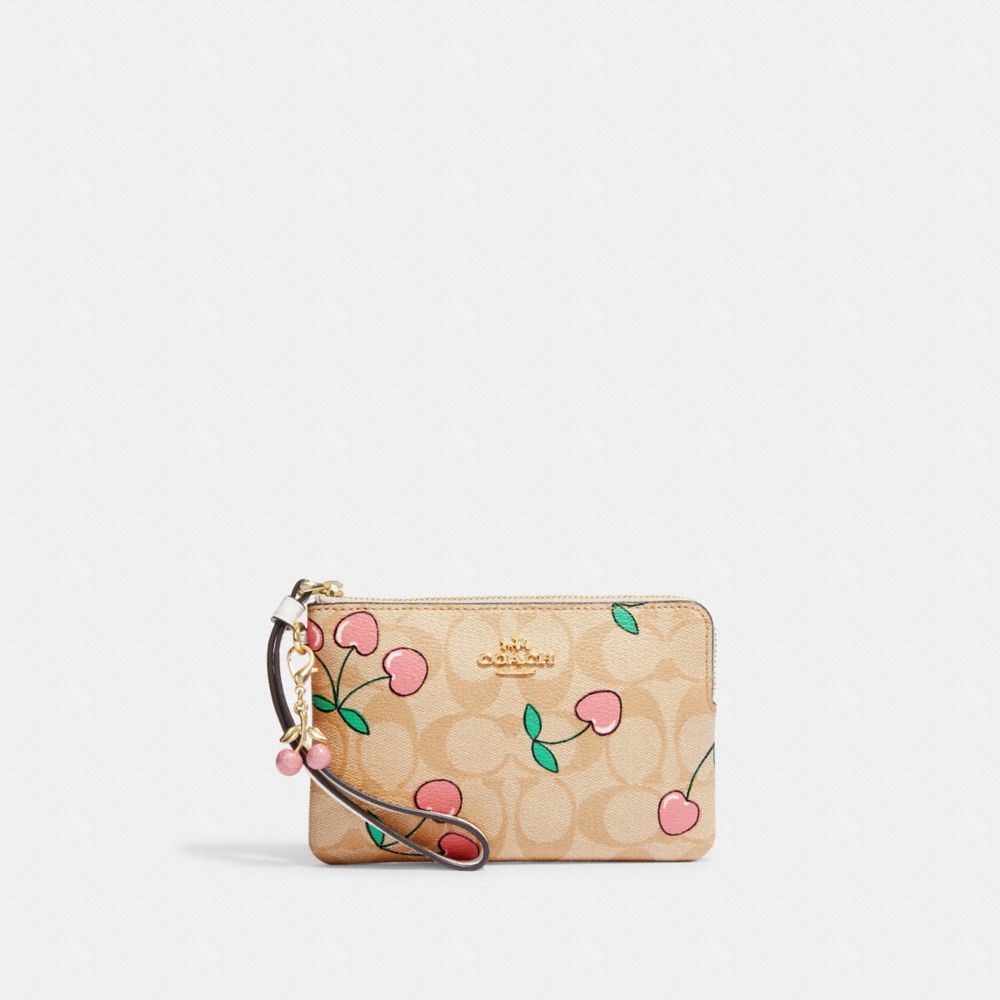 COACH®  Corner Zip Wristlet In Signature Canvas With Heart Cherry