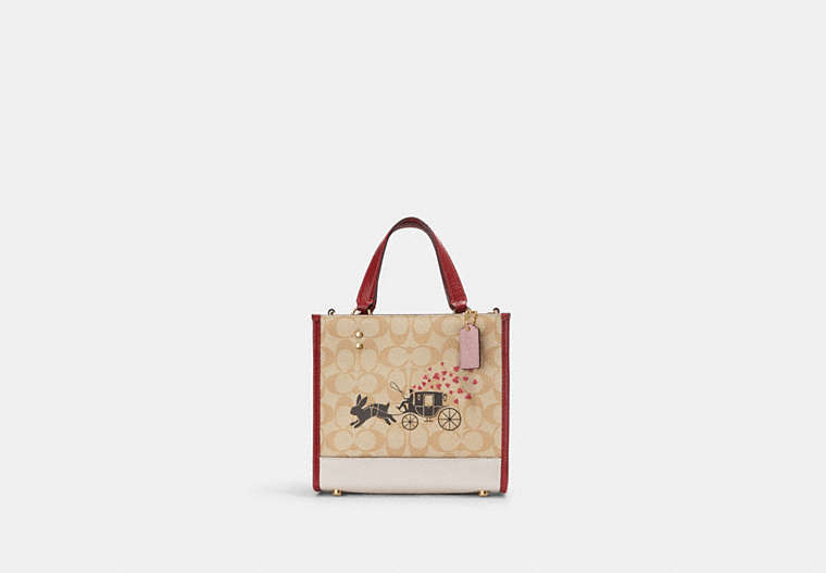COACH®,LUNAR NEW YEAR DEMPSEY TOTE 22 IN SIGNATURE CANVAS WITH RABBIT AND CARRIAGE,Medium,Gold/Light Khaki Multi,Front View