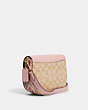 COACH®,MORGAN SADDLE BAG IN SIGNATURE CANVAS,Medium,Gold/Lt Khaki/Powder Pink Multi,Angle View