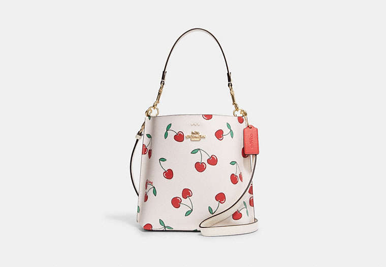 COACH®,MOLLIE BUCKET 22 WITH HEART CHERRY PRINT,Fabric,Medium,Gold/Chalk Multi,Front View