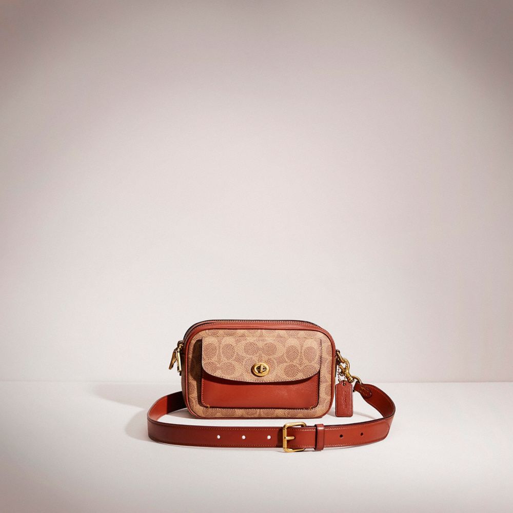 Coach camera bag shops in signature canvas