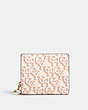 COACH®,SNAP WALLET WITH COACH MONOGRAM PRINT,Gold/Chalk,Front View