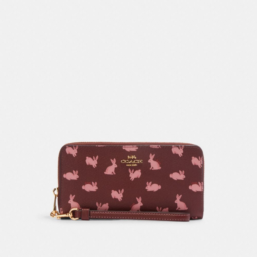 COACH®,LUNAR NEW YEAR LONG ZIP AROUND WALLET WITH RABBIT PRINT,Mini,Gold/Wine Multi,Front View