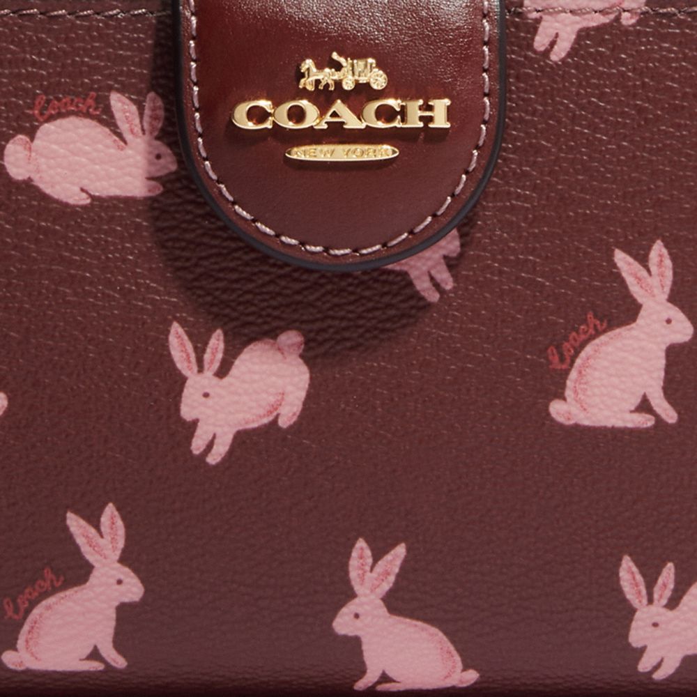 長財布【COACH コーチ】 ルーナー うさぎ ラビット柄 ラウンドジップリ