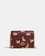 COACH®,LUNAR NEW YEAR MINI WALLET ON A CHAIN WITH RABBIT PRINT,Gold/Wine Multi,Front View