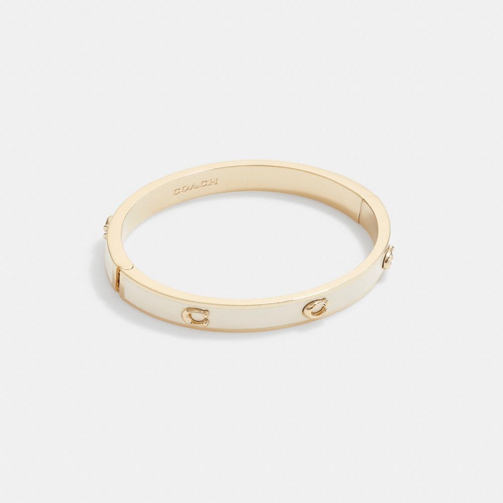 COACH®,PEGGED SIGNATURE HINGED BANGLE,enamel,Gold/Chalk,Front View