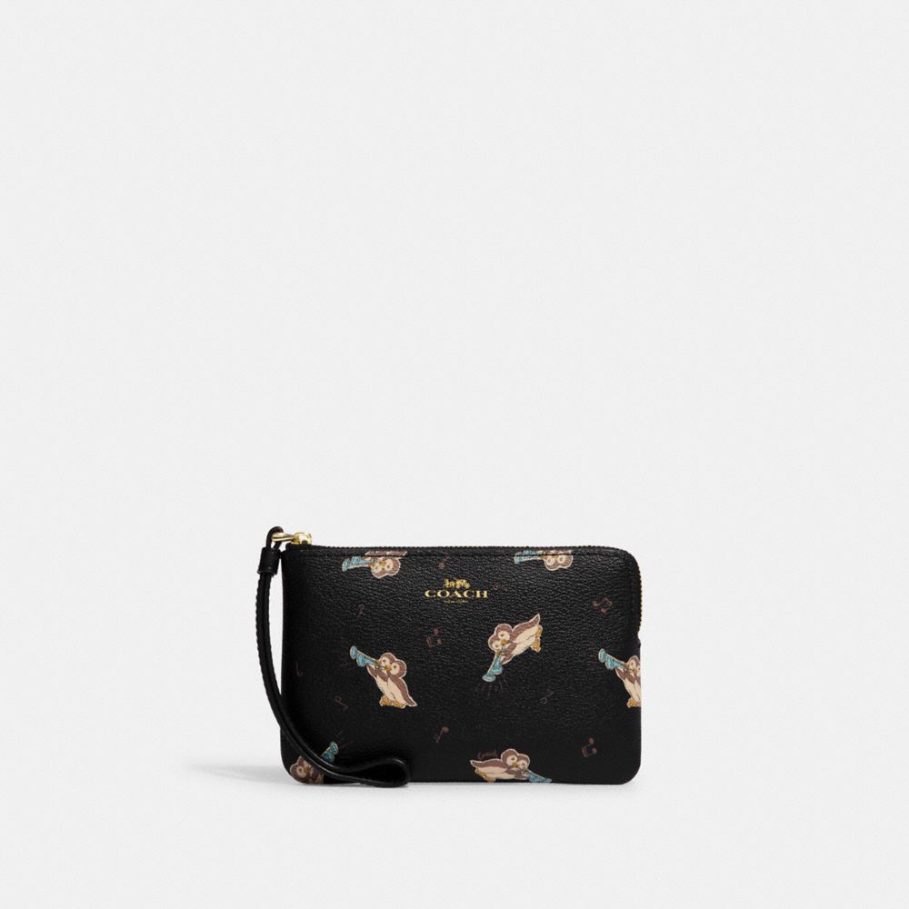 COACH®,CORNER ZIP WRISTLET WITH PENGUIN PRINT,Printed Coated Canvas,Mini,Gold/Black Multi,Front View