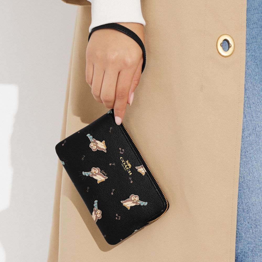 COACH®,Corner Zip Wristlet With Penguin Print,,Detail View