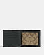 COACH®,3-IN-1 WALLET IN SIGNATURE CANVAS WITH VARSITY MOTIF,Black Antique Nickel/Khaki/Amazon Green,Inside View,Top View