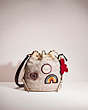 COACH®,UPCRAFTED FIELD BUCKET BAG IN SIGNATURE JACQUARD,Brass/Stone Ivory,Front View