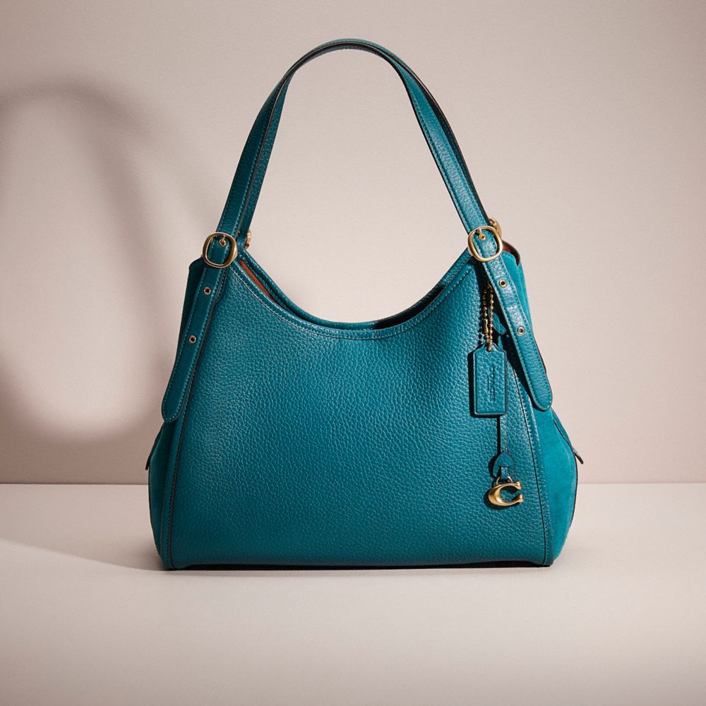 Turquoise coach bag sale