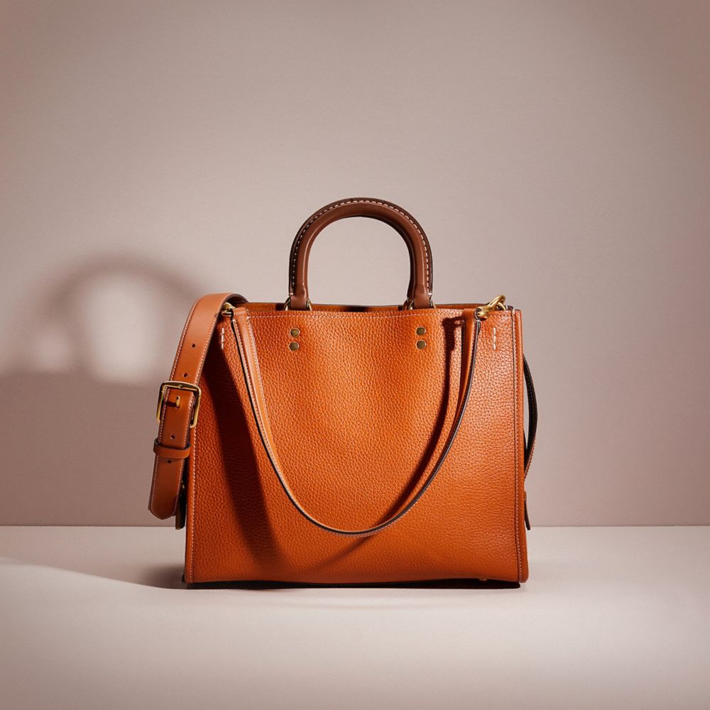 COACH®,RESTORED ROGUE IN COLORBLOCK,Pebble Leather,Large,Brass/Burnished Amber Multi,Front View