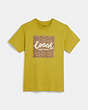 COACH®,シグネチャー グラフィック Tシャツ,トップス&パンツ,ｺﾞｰﾙﾃﾞﾝ ｵﾘｰﾌﾞ