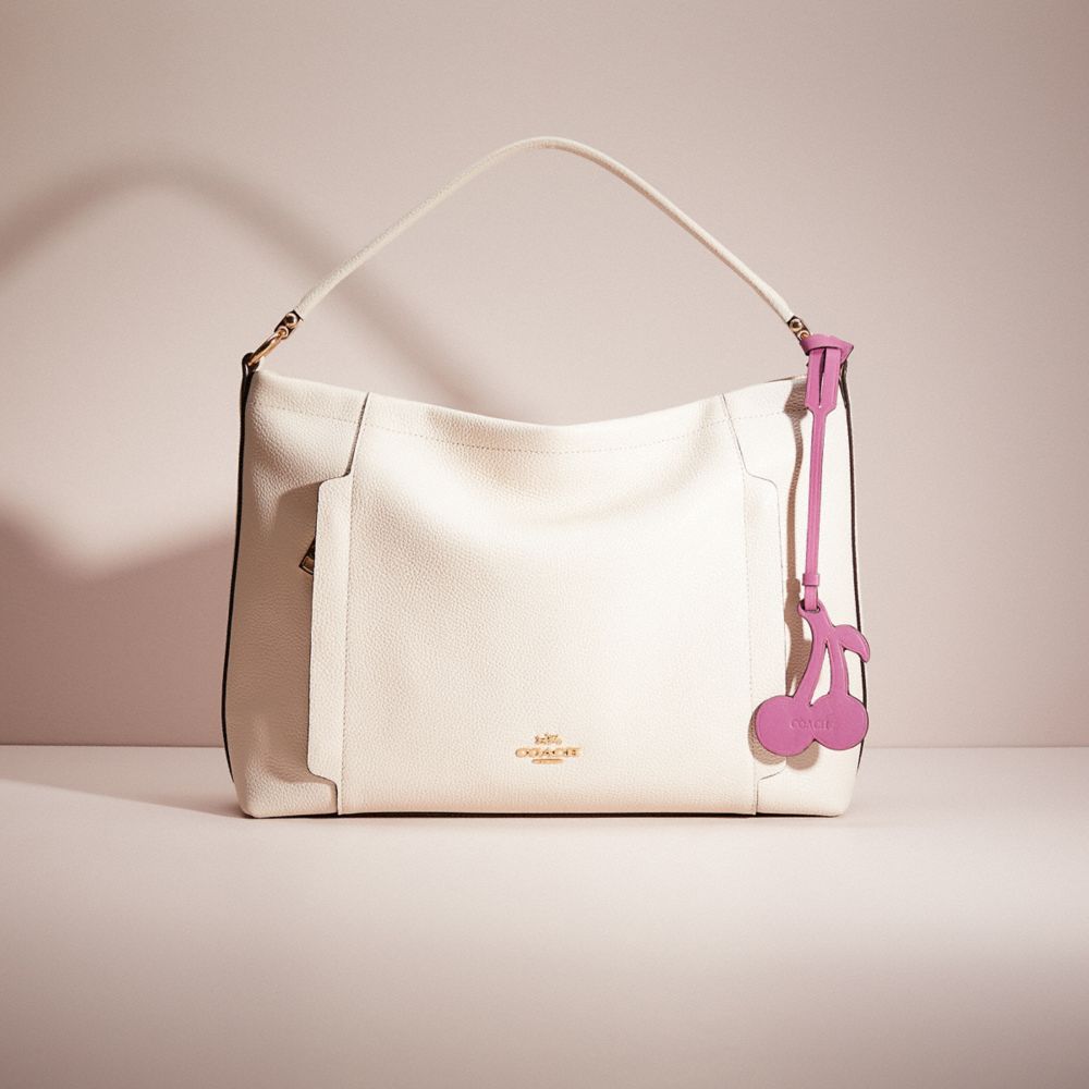 COACH®,Remade Cherry Bag Charm,,Angle View