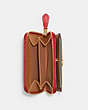 COACH®,BILLFOLD WALLET WITH REXY,Polished Pebble Leather,Mini,Brass/Sport Red,Interior View