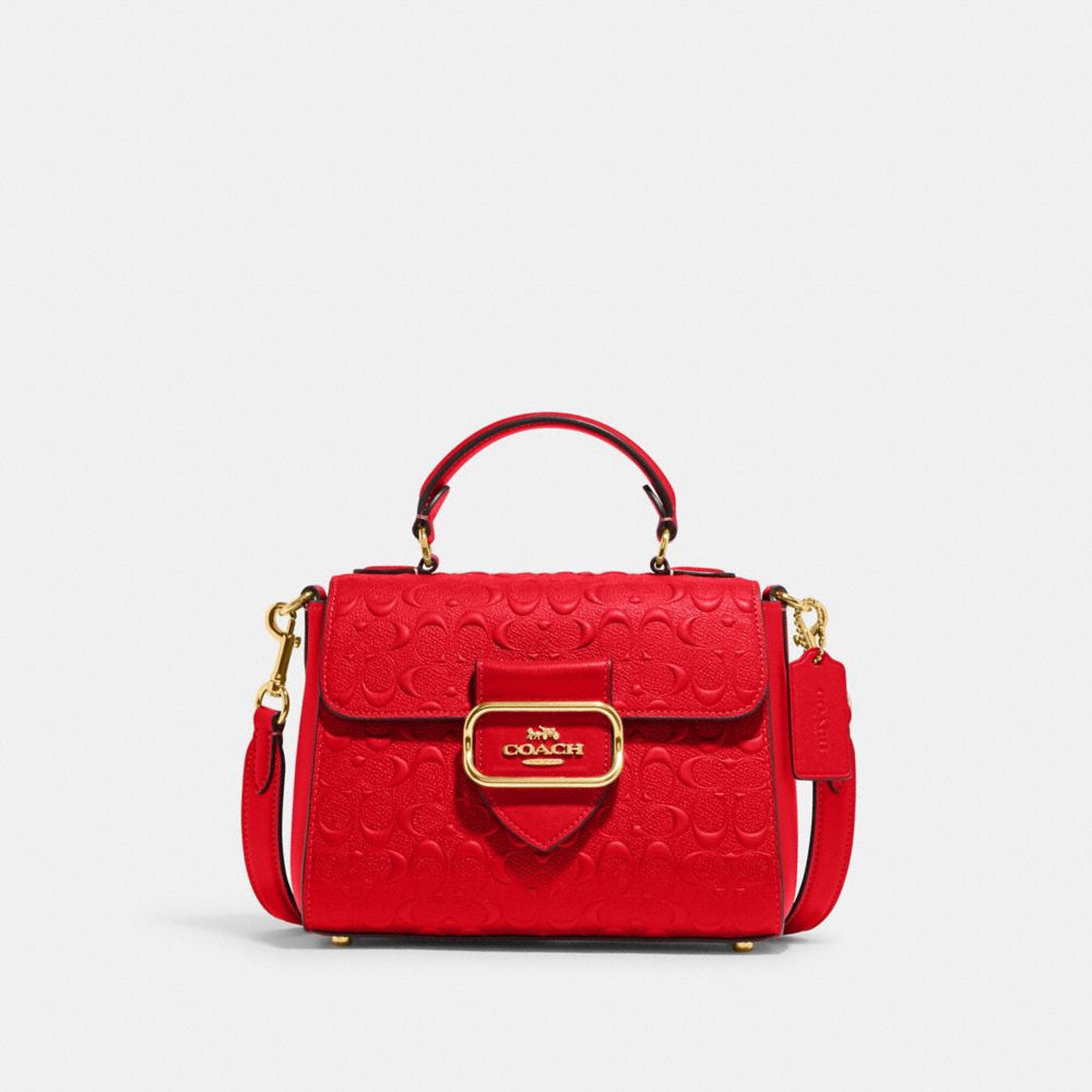 Coach bag with red handle sale