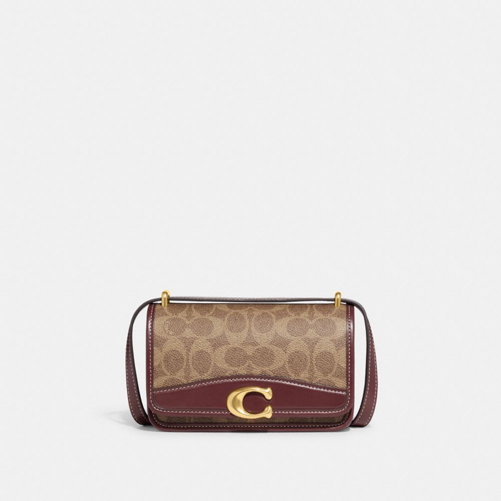 Coach rabbit purse sale