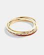 COACH®,SIGNATURE ENAMEL BANGLE SET,Brass,Gold/Red Glitter,Front View