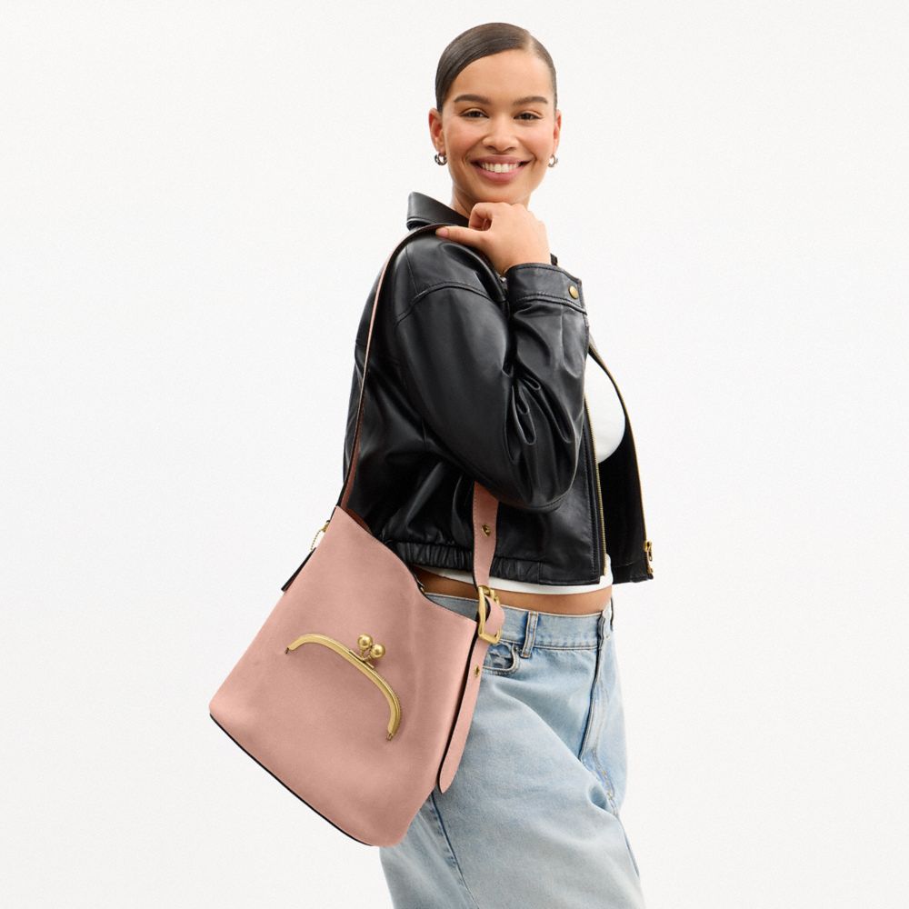 COACH®,Bleecker Bucket Bag With Kisslock,Suede,Leather,Bucket,Pendant,Adjustable,Brass,Day Party,Pink,Detail View
