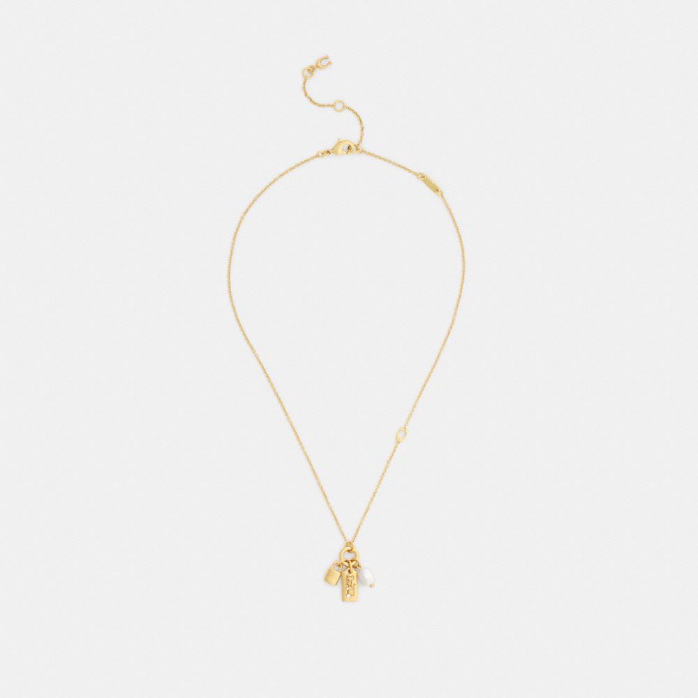 Женские брелоки Coach Pearl Charm Pendant Necklace — фото 2
