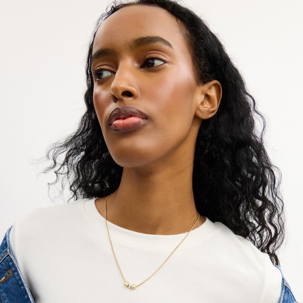 Coach Cube Pearl Rondelle Pendant Necklace — фото 3