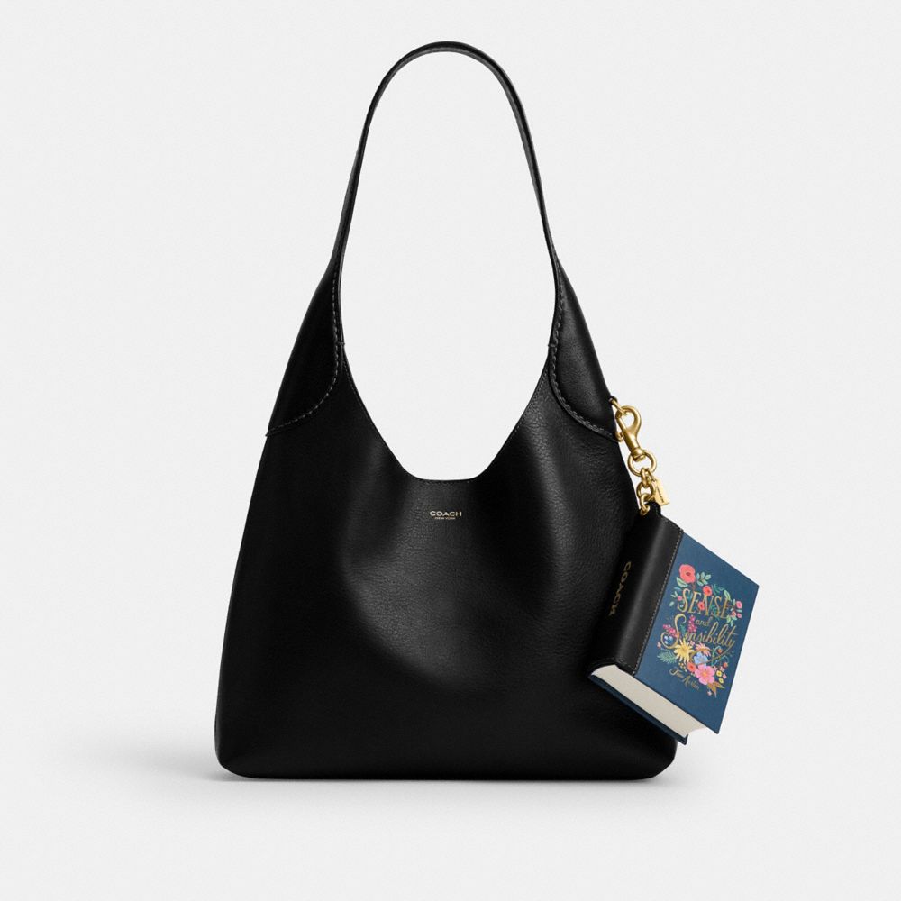 COACH®,Sense And Sensibility By Jane Austen Book Bag Charm,,Angle View