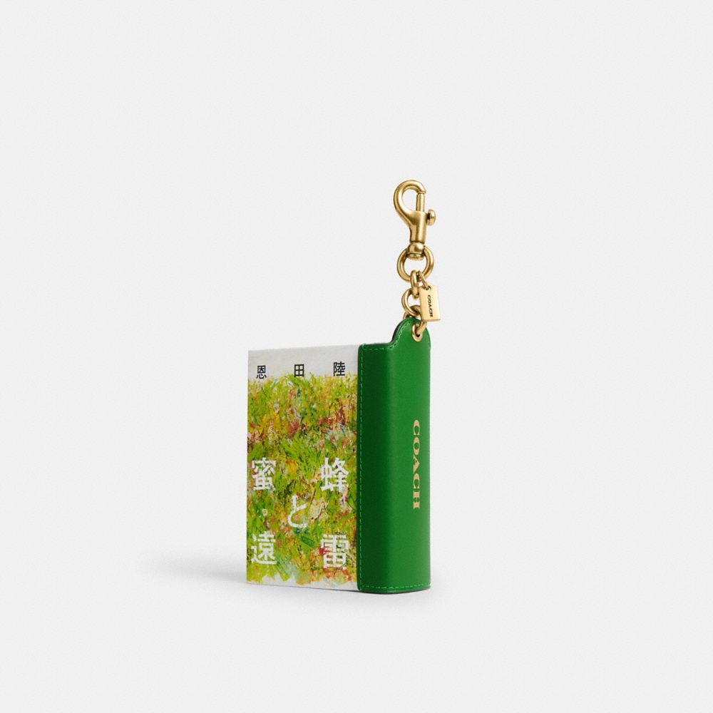 COACH®,Honeybees And Distant Thunder By Riku Onda Book Bag Charm,,Front View