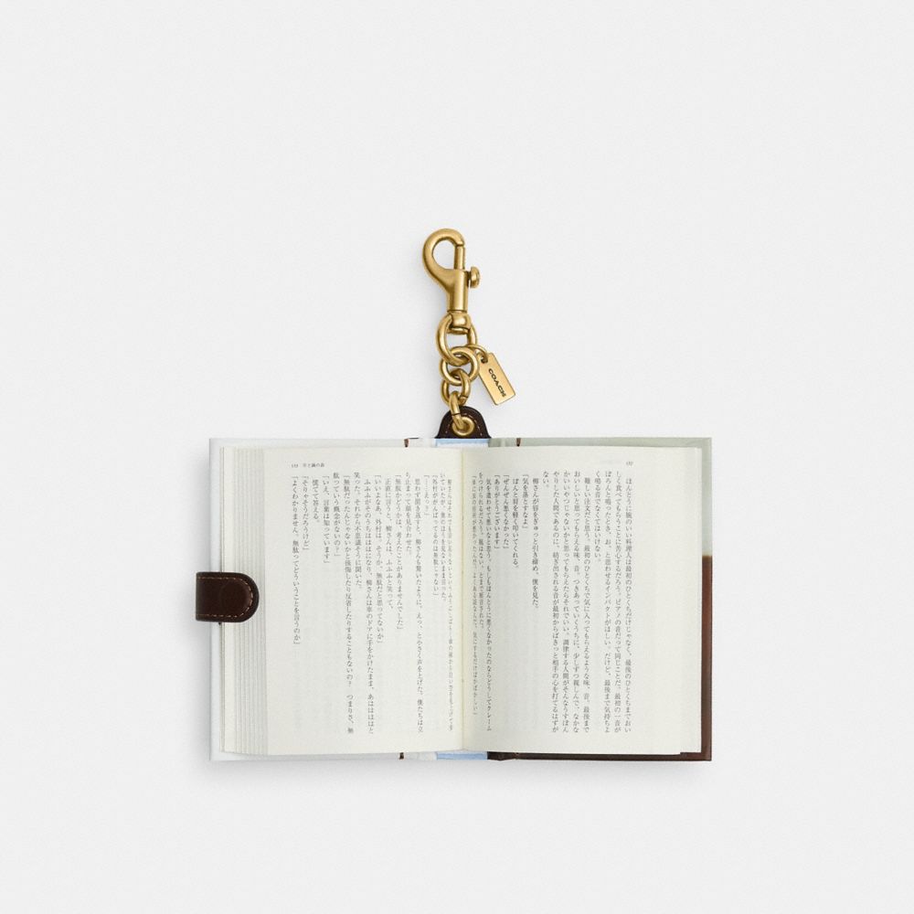 COACH®,The Forest Of Wool And Steel By Natsu Miyashita Book Bag Charm,,Inside View,Top View