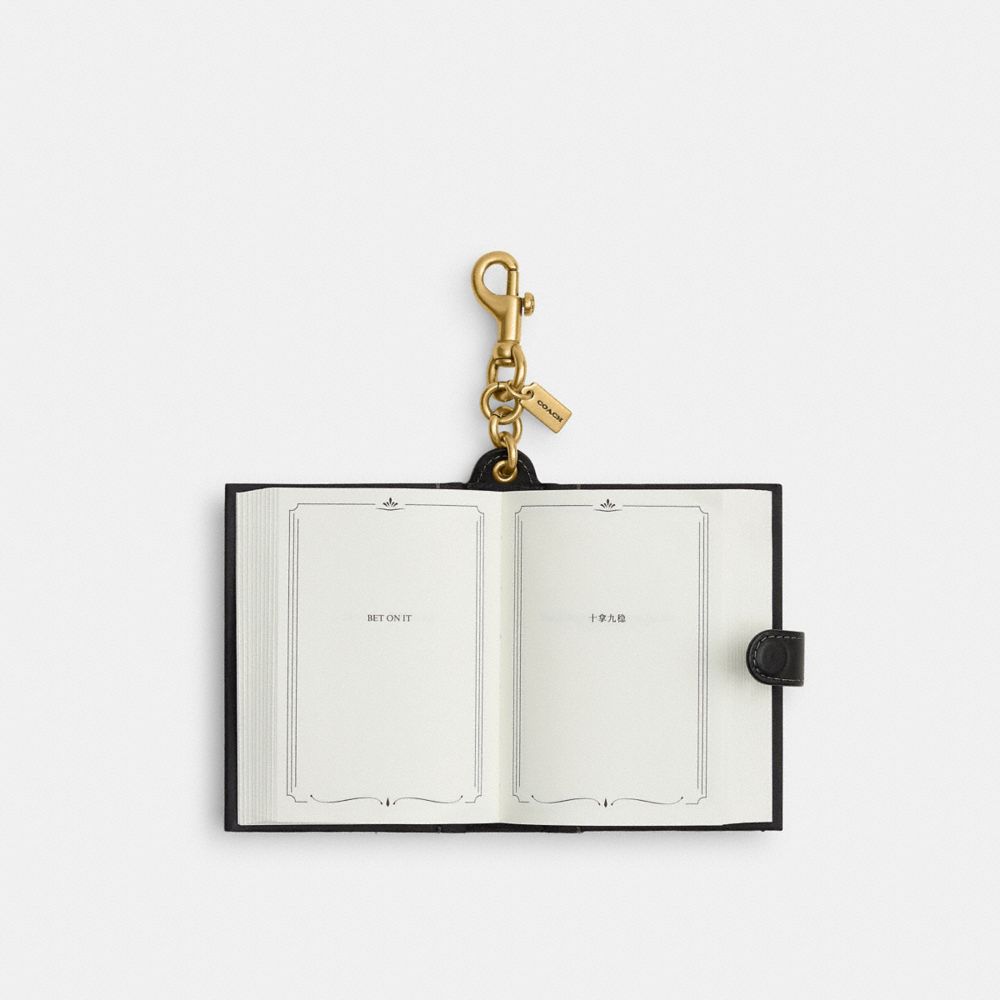 COACH®,The Book Of Answers By Carol Bolt Book Bag Charm,,Inside View,Top View