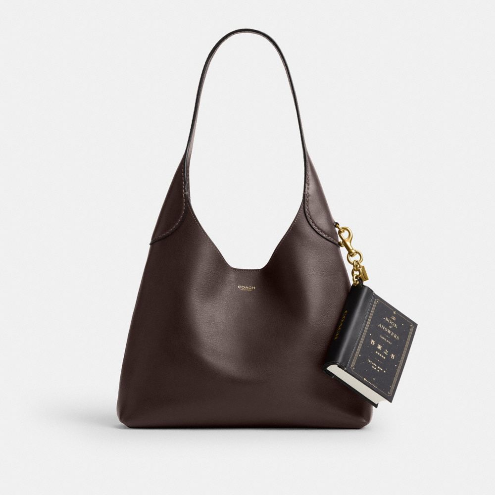 COACH®,The Book Of Answers By Carol Bolt Book Bag Charm,,Angle View