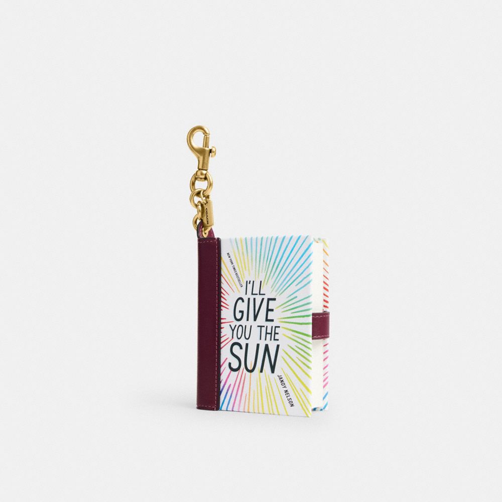 COACH®,I'll Give You The Sun By Jandy Nelson Book Bag Charm,,Front View