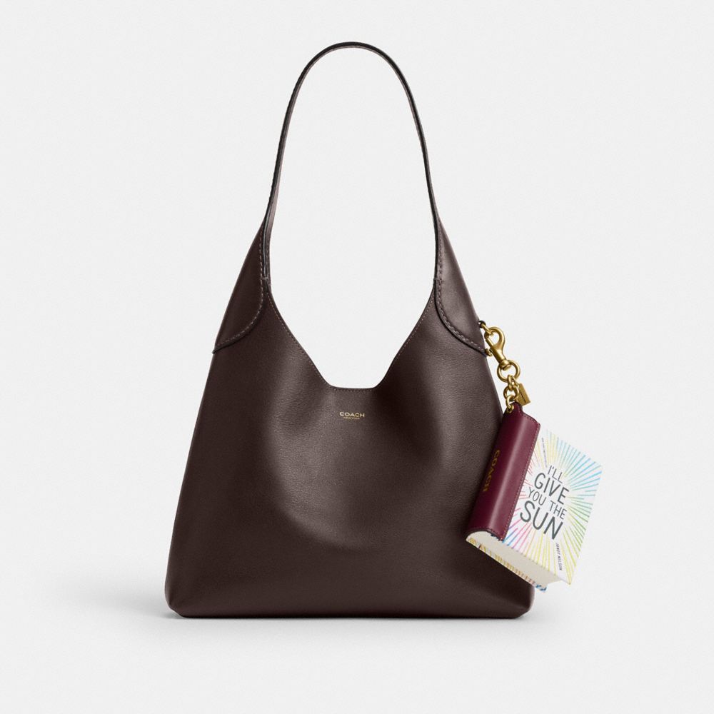 COACH®,I'll Give You The Sun By Jandy Nelson Book Bag Charm,,Angle View