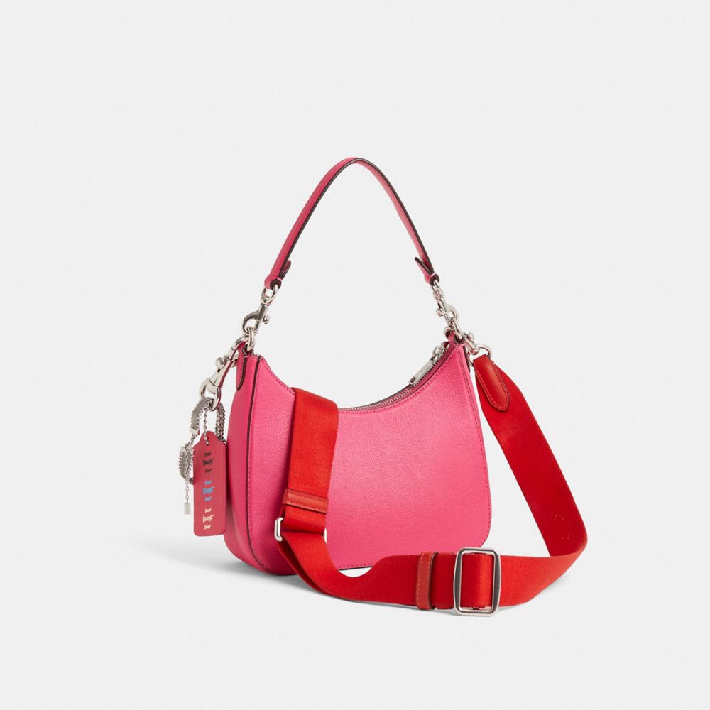 COACH®,Upcrafted Hobo Crossbody Bag,Pink,Angle View