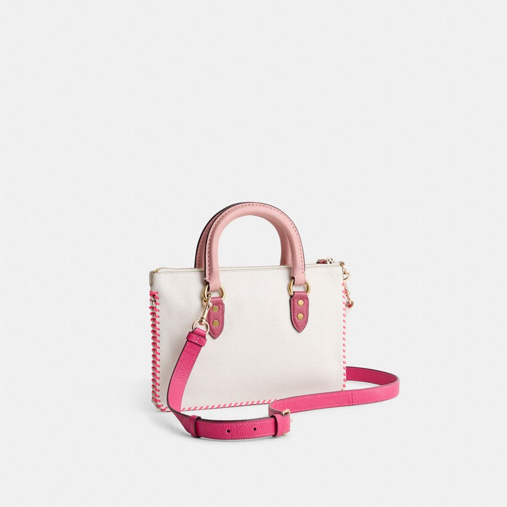 COACH®,Upcrafted Whip Lash Turnlock Wristlet Bag 26,Cream,Angle View