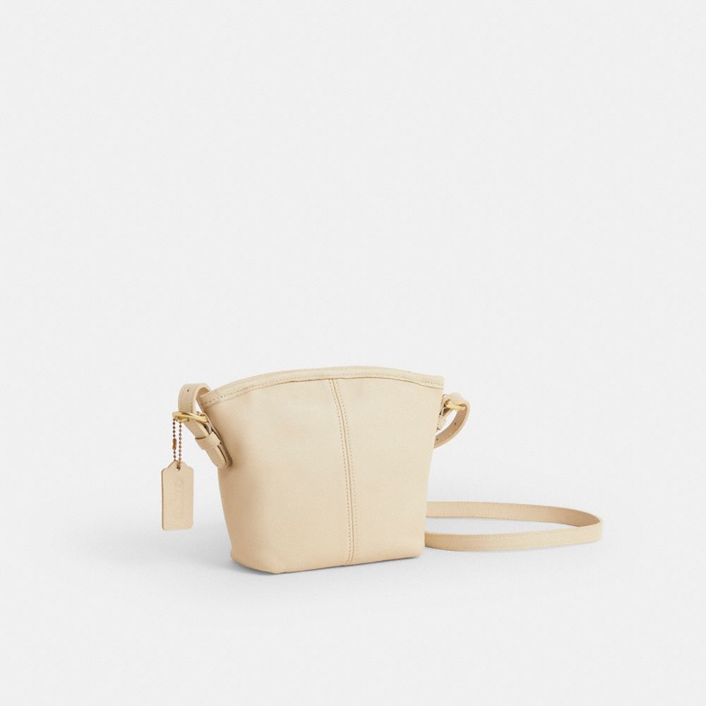 COACH®,Vintage Small Soho Basket Bag,Leather,Crossbody,Pendant,Adjustable,Gold Metal,Casual,Beige,Angle View